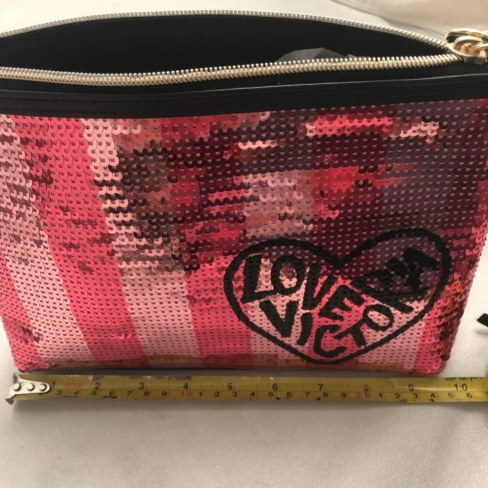 Victoria’s Secret pink and black sequin cosmetic or toiletries bag